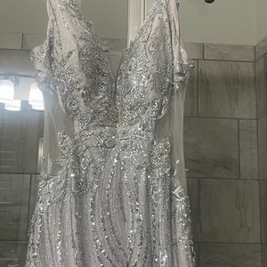 Dramatic, sparkling Portia and Scarlet gown with high slit